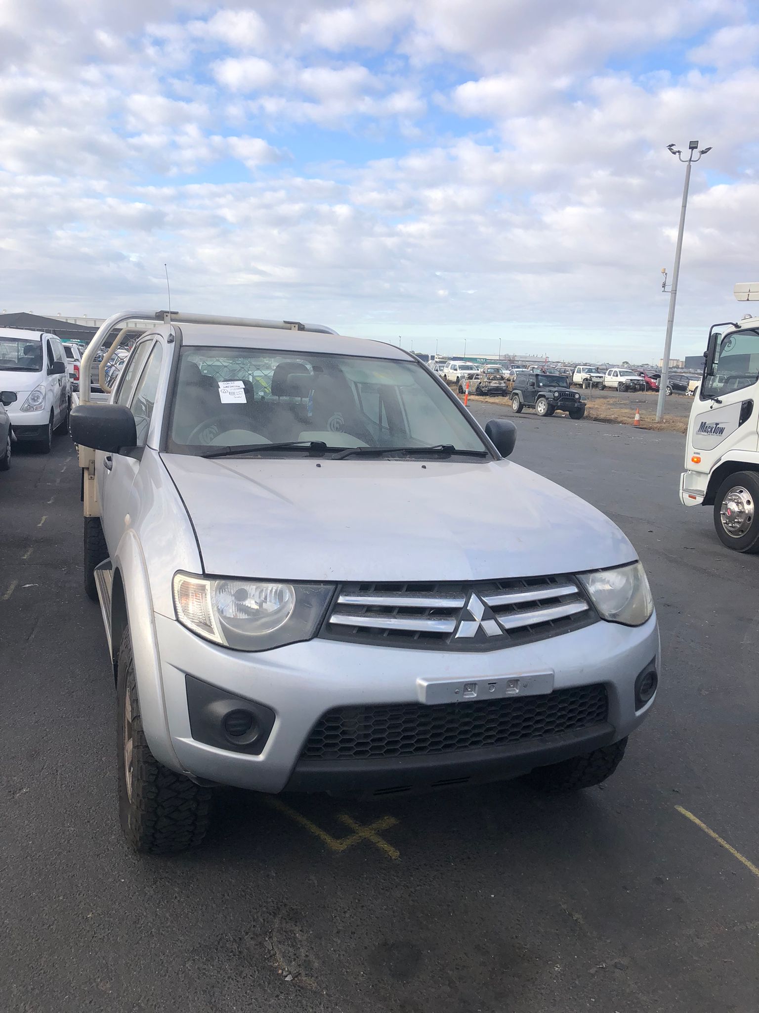 Sell My Scrap Car Dalmore VIC 1 Silver SUV parked in a vehicle yard