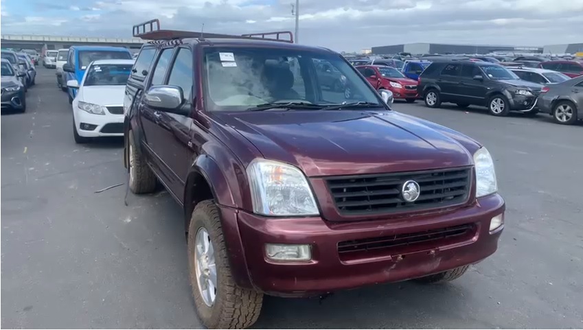 Sell My Scrap Car Dewhurst VIC 1 Maroon utility vehicle in a vehicle yard