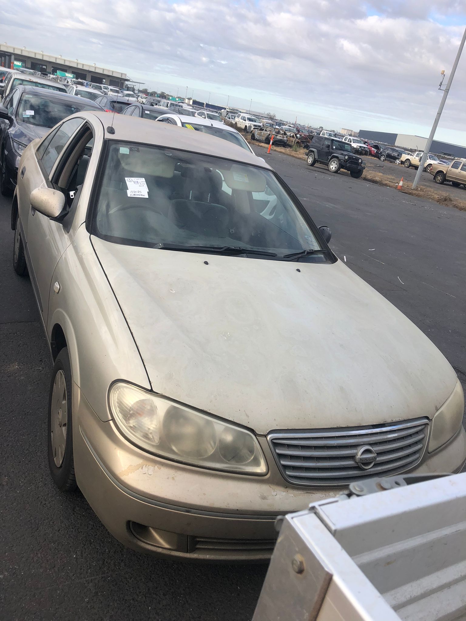 Sell My Scrap Car Niddrie VIC 1 Silver sedan parked beside other vehicles