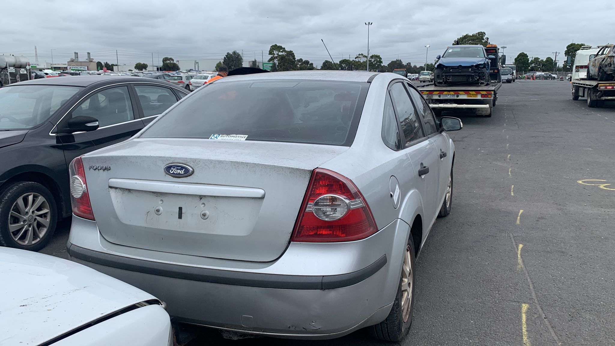 Sell My Scrap Car Beveridge VIC 1 White sedan photographed from the rear