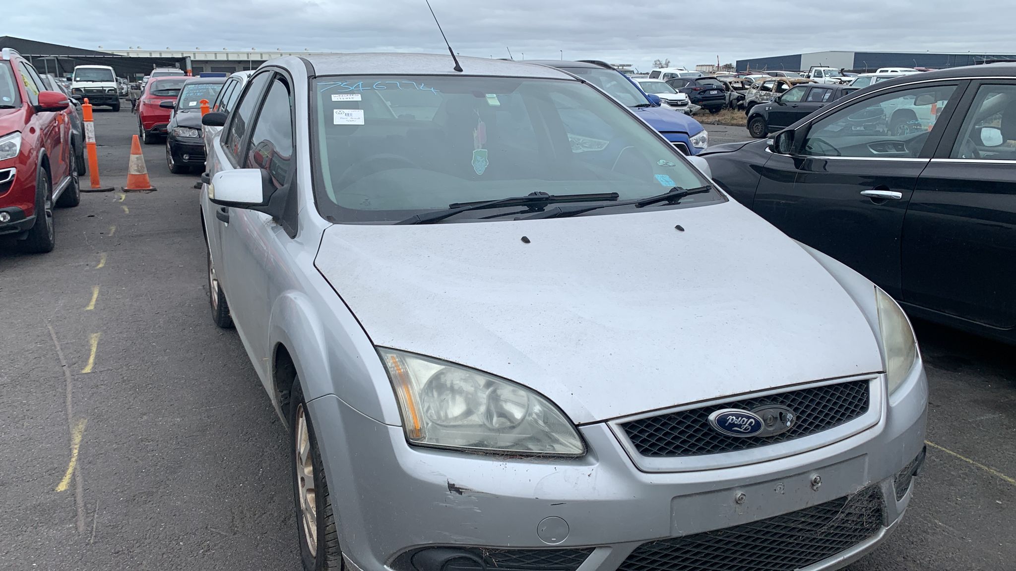 Sell My Scrap Car Matlock VIC 1 Silver hatchback in a vehicle yard