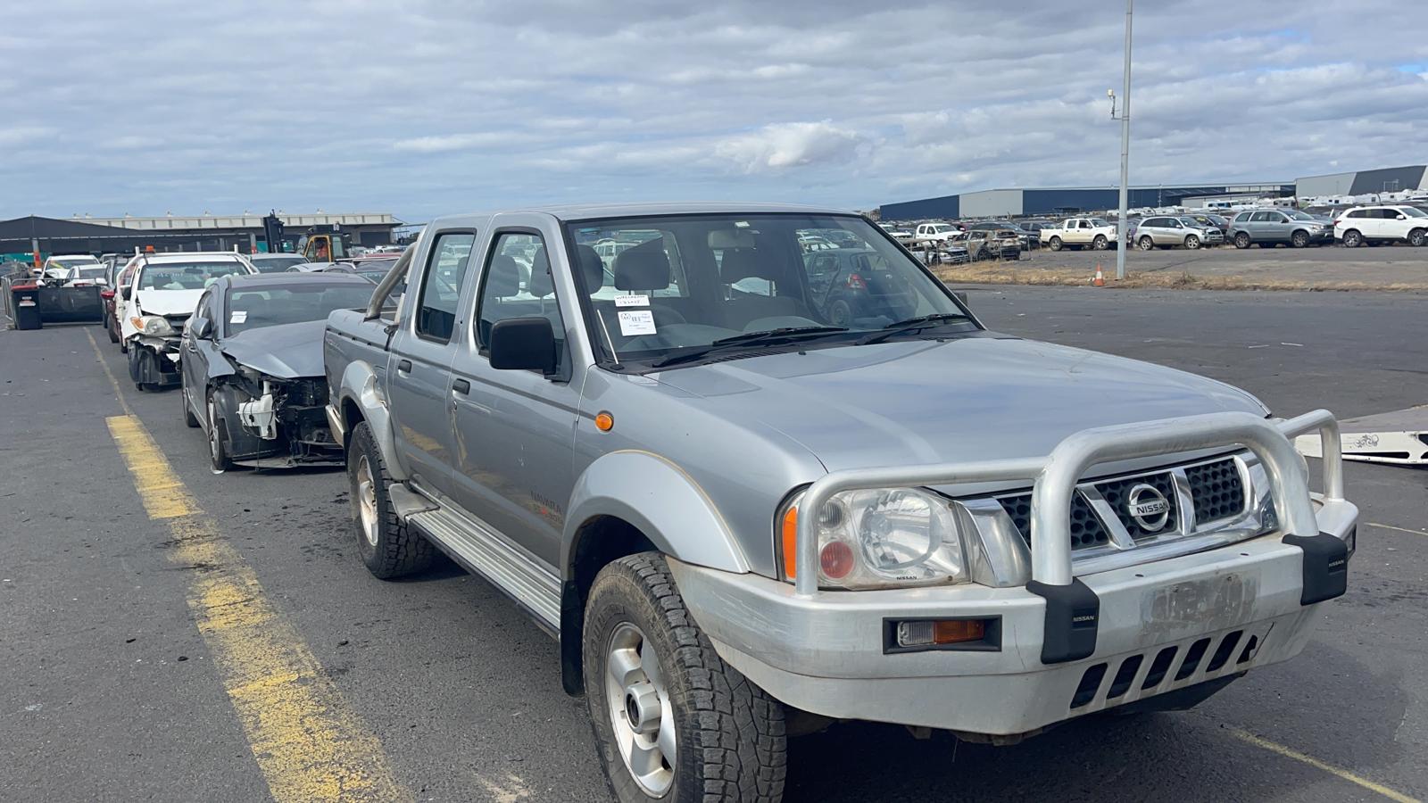 Sell My Scrap Car Smiths Gully VIC 1 Silver utility vehicle in a vehicle yard