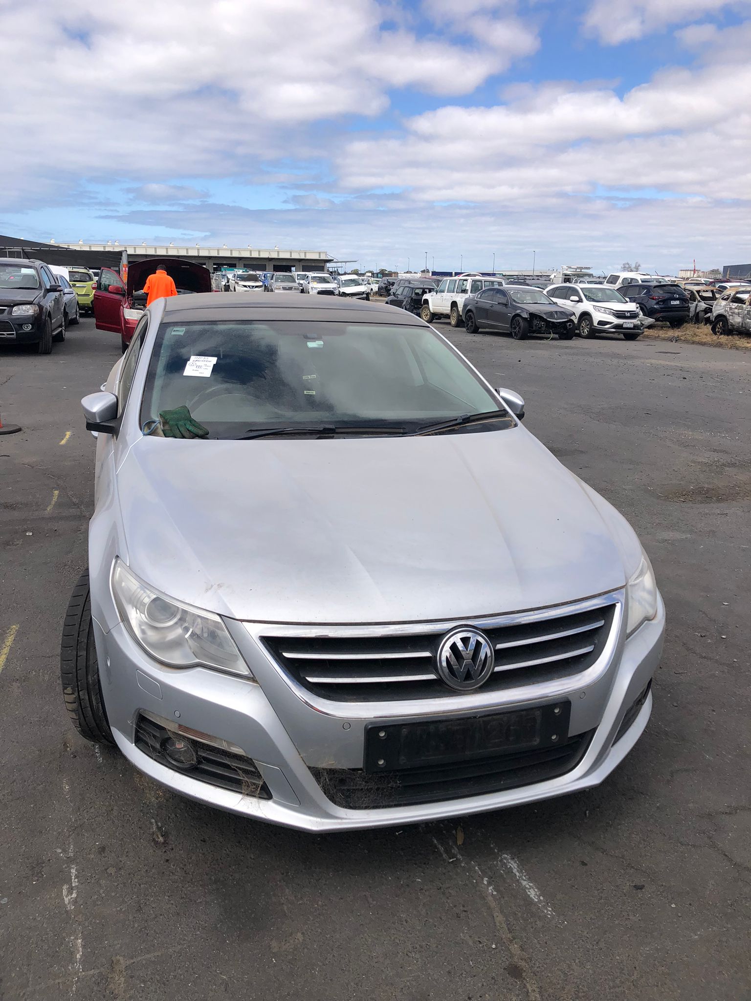Silver sedan photographed from the front